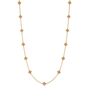 This dainty, double-sided station chain necklace is a vision in bright, gleaming gold and iridescent mother of pearl, interspersed with our clever double-sided clovers that playfully flip throughout the day—from mother of pearl clovers with golden berry centers to golden clovers with mother of pearl centers. Wear it long or doubled around your neck for a layered look.