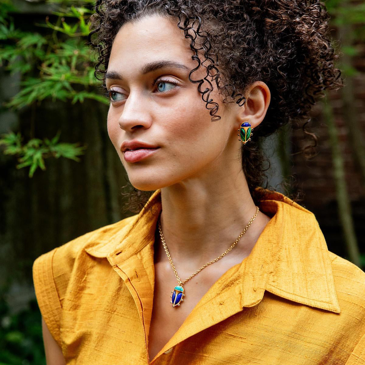 Scarab Charm Necklace 16in 2in Multi in multicolor, lifestyle setting