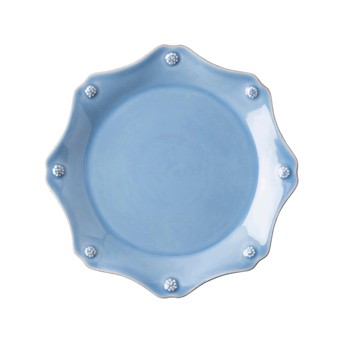 Rimmed with a simple thread and adorned with a sprinkling of berries, this iconic dinnerware collection embraces historic motifs in a sublime blue hue. A sweetly scalloped dessert/salad plate with so many of our collections.