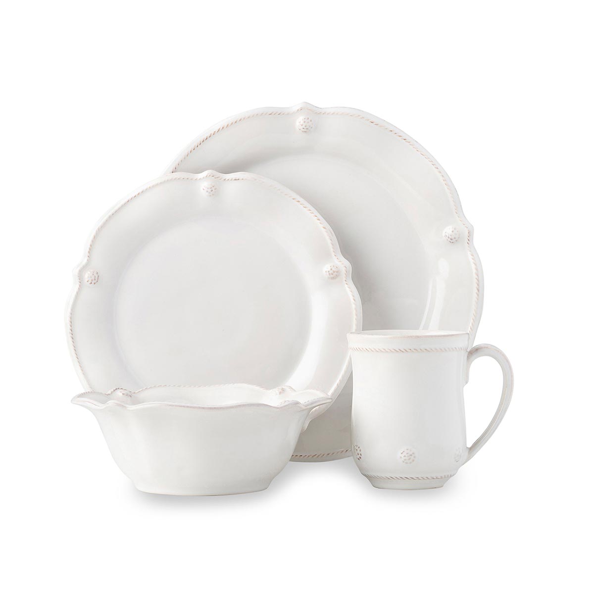 Adorned with a sprinkling of berries and new fluted silhouette, this four piece setting includes: dinner plate, dessert/salad plate, cereal bowl and cofftea cup.