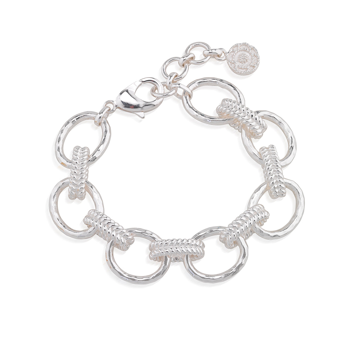 A silver link bracelet featuring alternating smooth oval links and textured rope-style links, with a lobster clasp and a small round charm, shown on a plain white background.