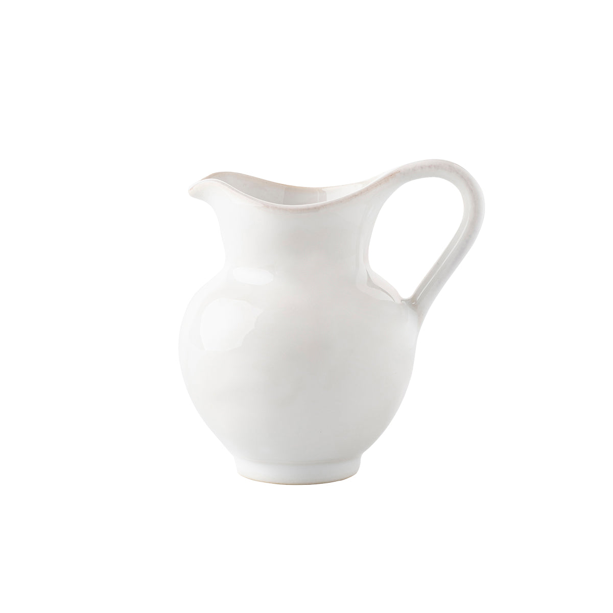 This jug has just the right splash of curves - yet an overall sleek silhouette - making it the perfect accessory to a simply chic cup of coffee or tea.