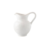 This jug has just the right splash of curves - yet an overall sleek silhouette - making it the perfect accessory to a simply chic cup of coffee or tea.
