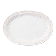 The large scale of this basket-weave motif instantly evokes the bounty of the earth and echoes of its harvest. Richly textural and classic in our whitewash glaze, this platter serves up your superstar dishes for a crowd with elegant ease.