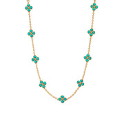 This dainty, double-sided station chain necklace is a vision in bright, gleaming gold and turquoise blue, interspersed with our clever double-sided clovers that playfully flip throughout the day—from turquoise clovers with golden berry centers to golden clovers with turquoise centers.