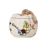 White six-inch pumpkin-shaped bowl with lid, adorned with colorful designs of flora and fauna.