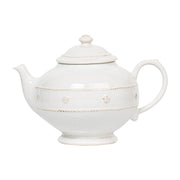 Soothe spirits with the timeless ritual of tea. Our rotund teapot is clad in joyful garlands for an enduringly classic look that mixes seamlessly with all of our collections.