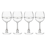 Statuesque and stately, this set of four white wine glasses bring instant Bohemian beauty - and a splash of drama - to any table they grace. Bedecked with a simple glass thread and a single berry, this goblet is as understated as it is glamorous. Perfect for connoisseurs, newlyweds, entertaining enthusiasts, and bon vivants alike. Beautifully packaged in our signature Juliska gift box (psst…a set of four makes a dinner, a set of eight makes a party)