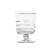 Flickering candlelight is taken to new heights with this exquisite hurricane that is festooned with the uplifting swirl of our iconic glass thread and single berry that never fails to enhance the magical twinkle and romance of any setting. Made of expertly mouth-blown glass with intricate details that only a master glass artist can produce, this versatile vessel is also fantastic for floral arrangements and makes a fabulous gift.