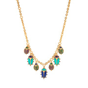 A sacred ancient Egyptian symbol of strength and resilience, these irresistible scarabs are hand crafted with vibrant jewels with swaying movement as they flip playfully throughout the day (or while dancing in moonlight) to reveal golden underbellies with radiant sunbursts. Just like all families, each charming creature is similar and unique, with intricate gilded exoskeletons and vibrant hand-carved wings and heads in a riot of colorful amethyst, lapis, malachite and turquoise.