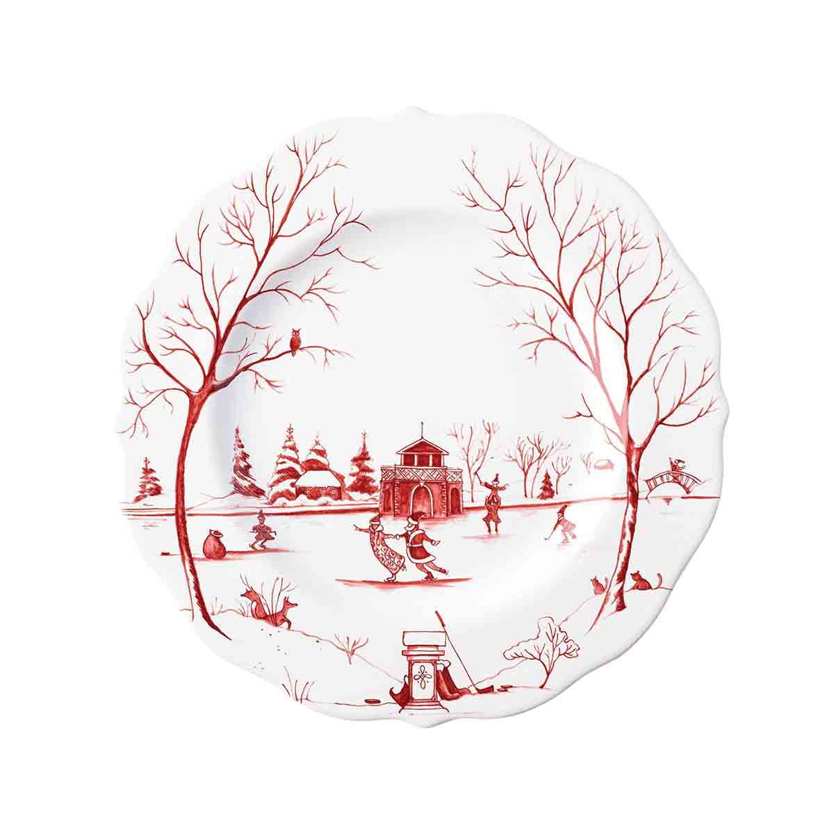 White plate with red artwork of figures skating on an ice-covered pond.