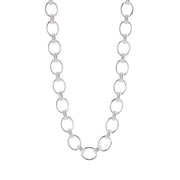 A silver-toned chain necklace featuring alternating large polished oval links and smaller textured round links, displayed on a clean white background.