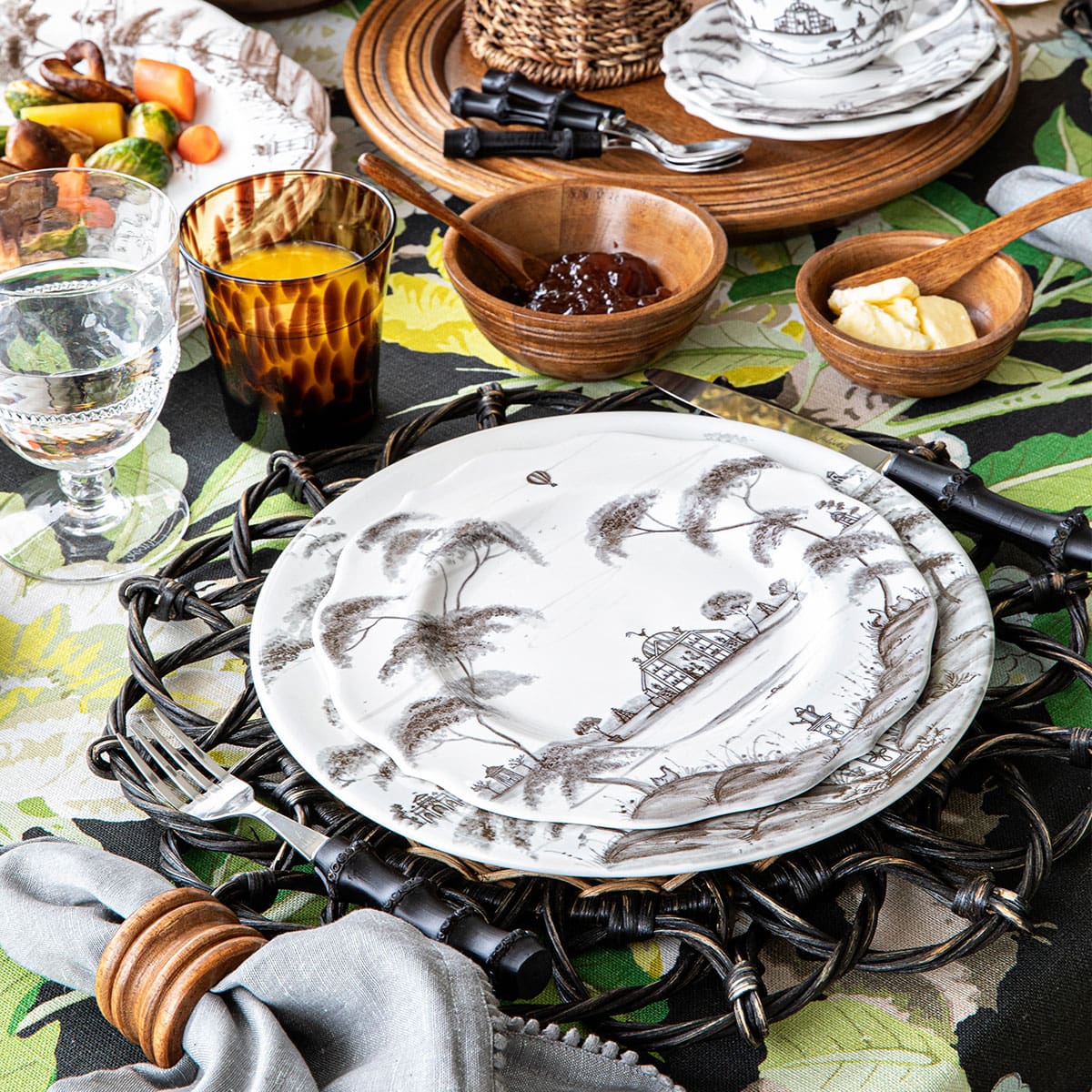 country estate flint plates on a black placemat