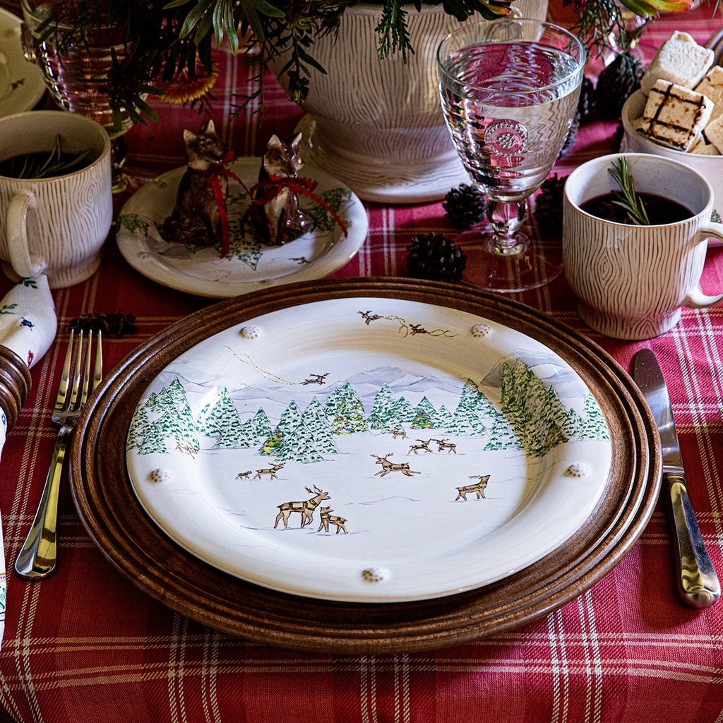 Berry and Thread North Pole place setting on a red plaid tablecloth. 