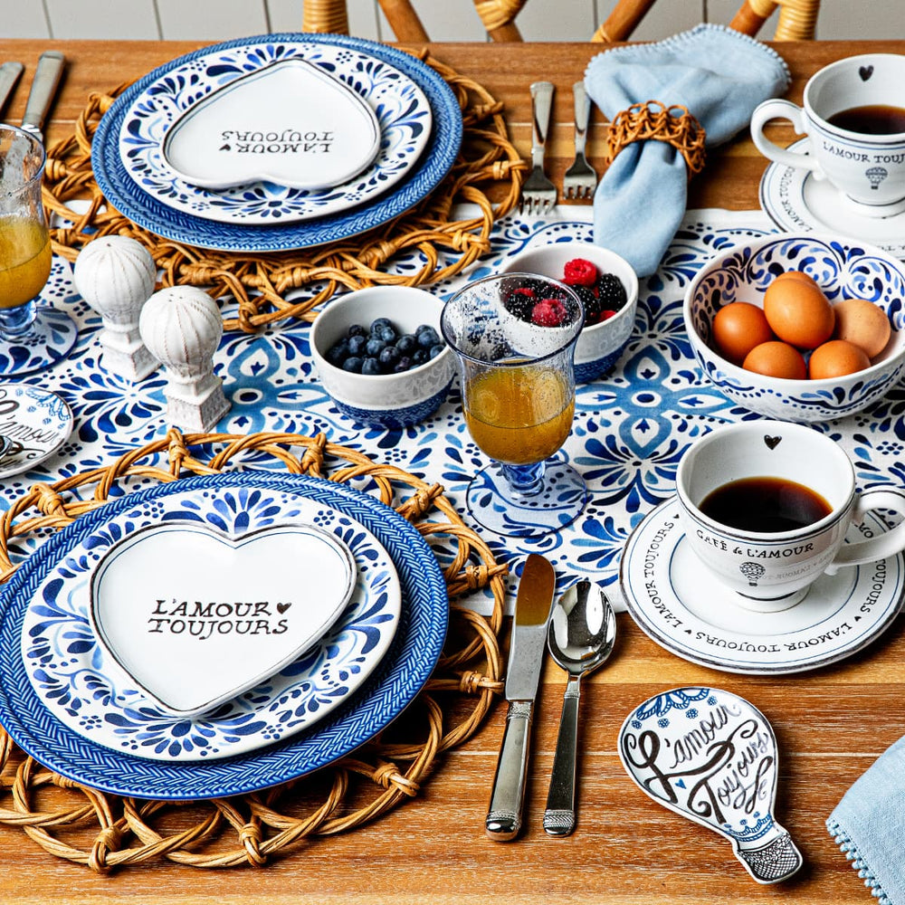 Juliska L'Amour Toujour collection displayed with Le Panier Delft Blue plates and Iberian tablecloth and plate