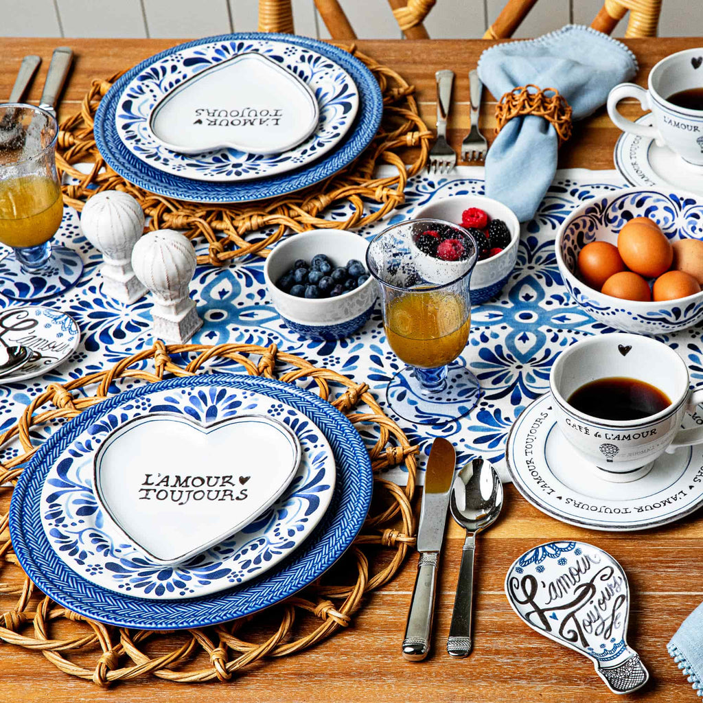 Image featuring a variety of blue plates and serveware from Le Panier, L'Amour Toujour and Iberian collections within a tablescape