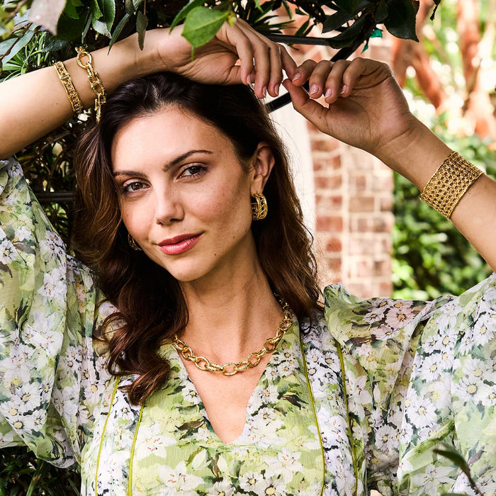 Woman modeling Capucine De Wulf bamboo jewelry