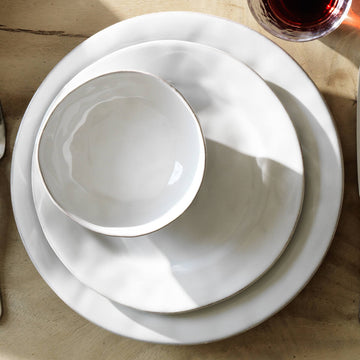 The Portuguese reserve the word Puro for something that is truly alluring in its natural state.  Our Puro collection of dinnerware resembles the soft texture of rumpled linen.
