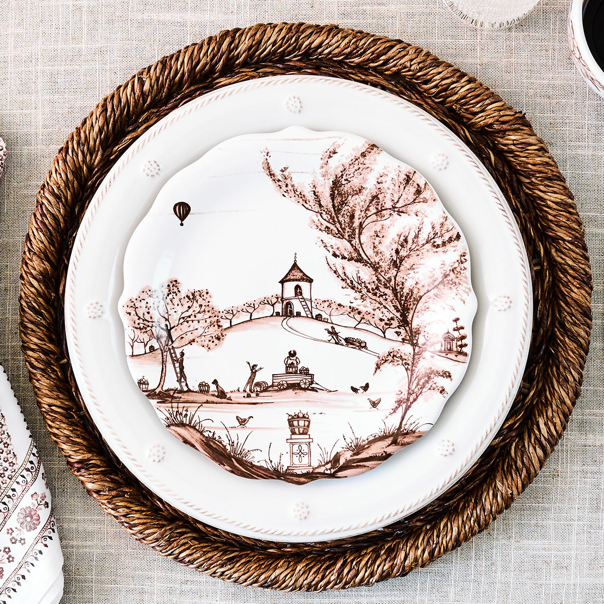 Decorative plate with a landscape design on a textured surface