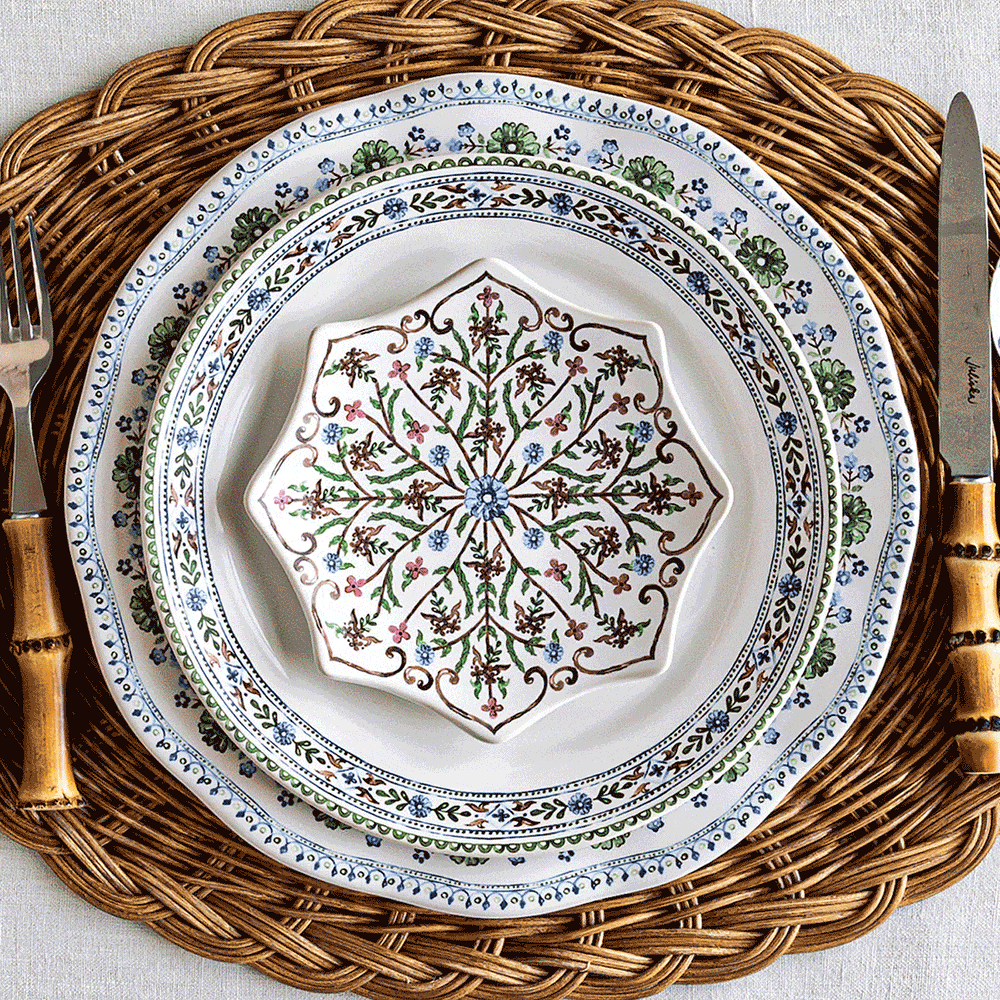 Moveable gif featuring Villa Seville, Bilbao Sage, and Puro Blush plates on a straw placemat