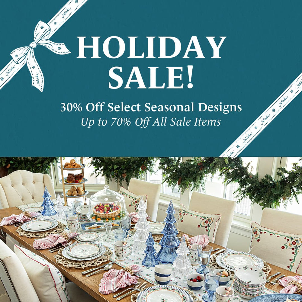 Advertisement for holiday sale with a decorated dining room table.