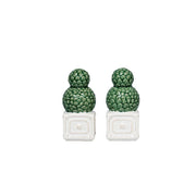 Instantly evocative of formal gardens found at resplendent European castles and estates, this hand-painted topiary set of salt and pepper shakers is a must-have addition to any spring or summer table setting. Equally chic and whimsical, you may want to keep them on the countertop in perpetuity (and they make a fabulous gift)!