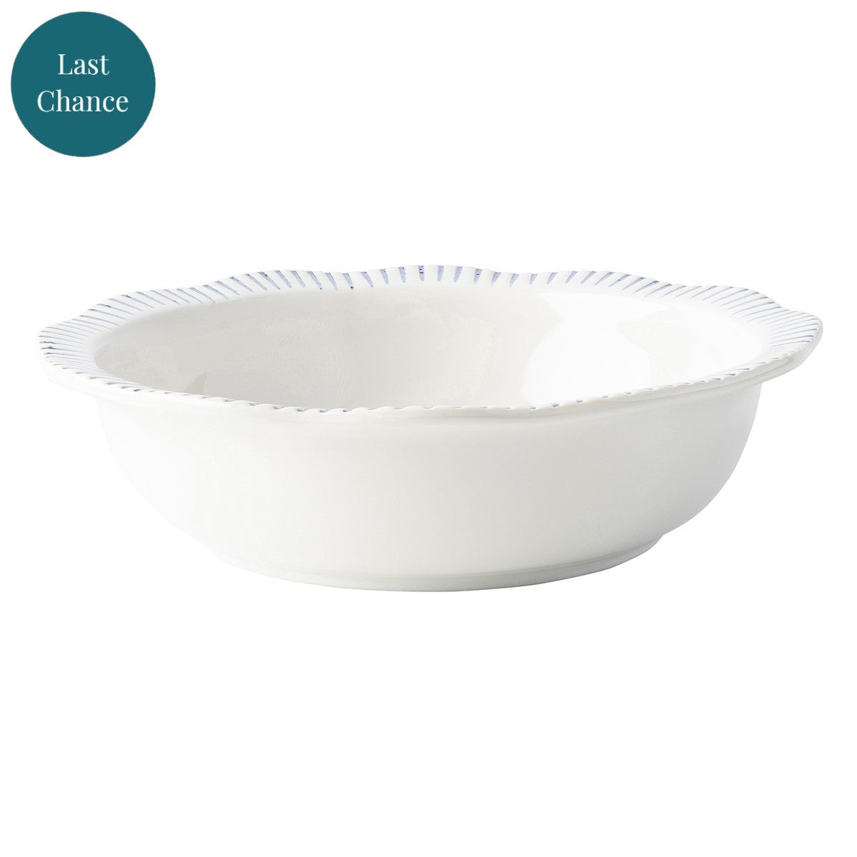 Equally stunning and simplistic, radiant stripes in breezy shades of blue adorn this dinnerware collection. Perfectly sized, this serving bowl is ideal for adding a touch of wanderlust to your table.