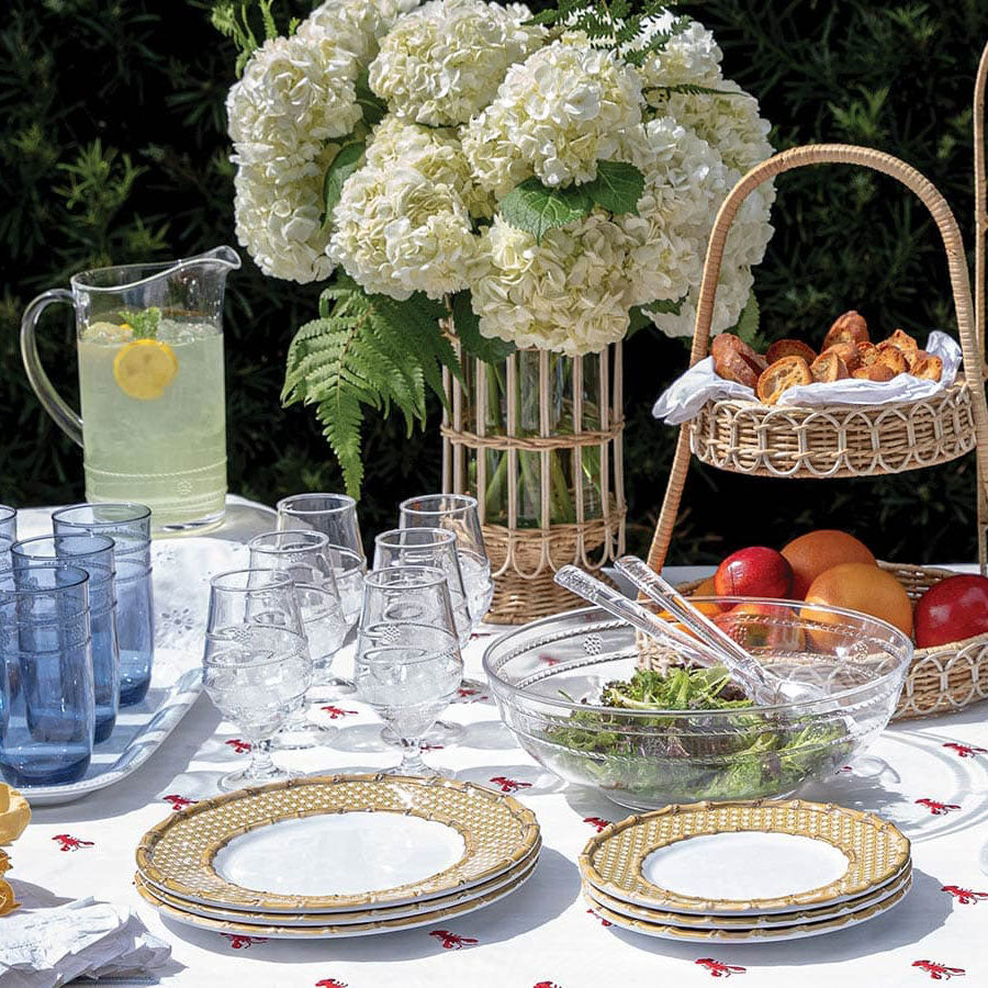 Poolside feast of salad, lemonade and BLT supplies.
