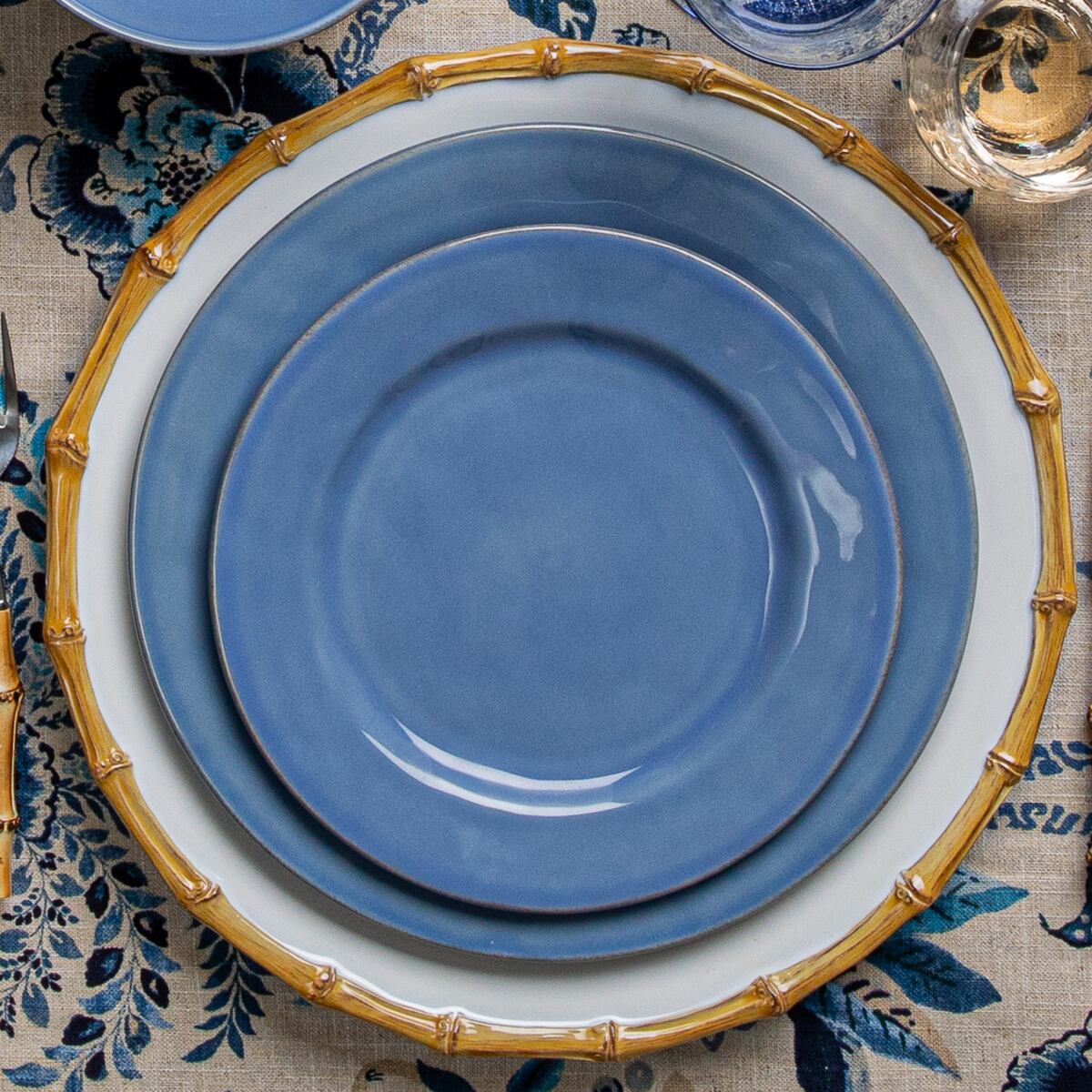 Puro Chambray Dessert and Salad Plate stacked on a Bamboo Dinner Plate