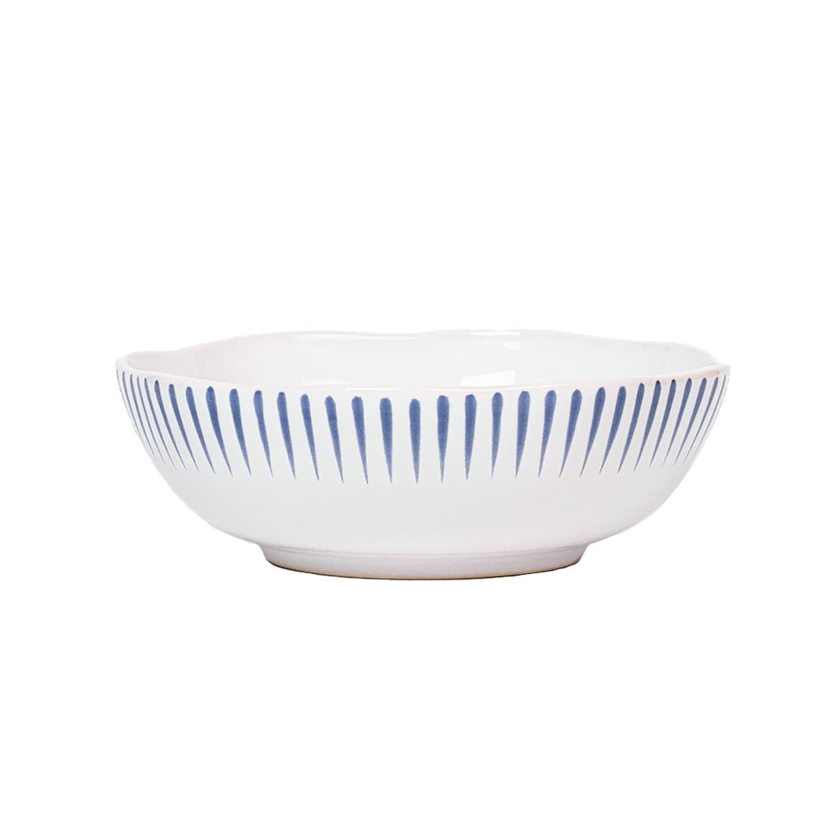Accented by our artistic rim of radiant Delft blue stripes that express a subtle ta-da! with every serving, the wide basin and shallow depth of this coupe bowl is ideal for grains, pastas, salads and sides.