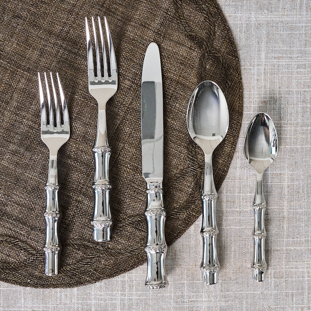Polished Bamboo flatware laying on a placemat