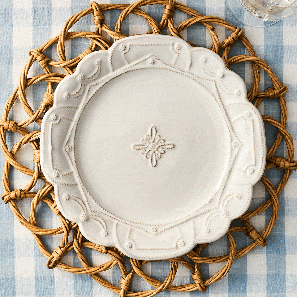 Moveable square gif of blue, white, floral and taupe plates stacked on a blue gingham tablecloth