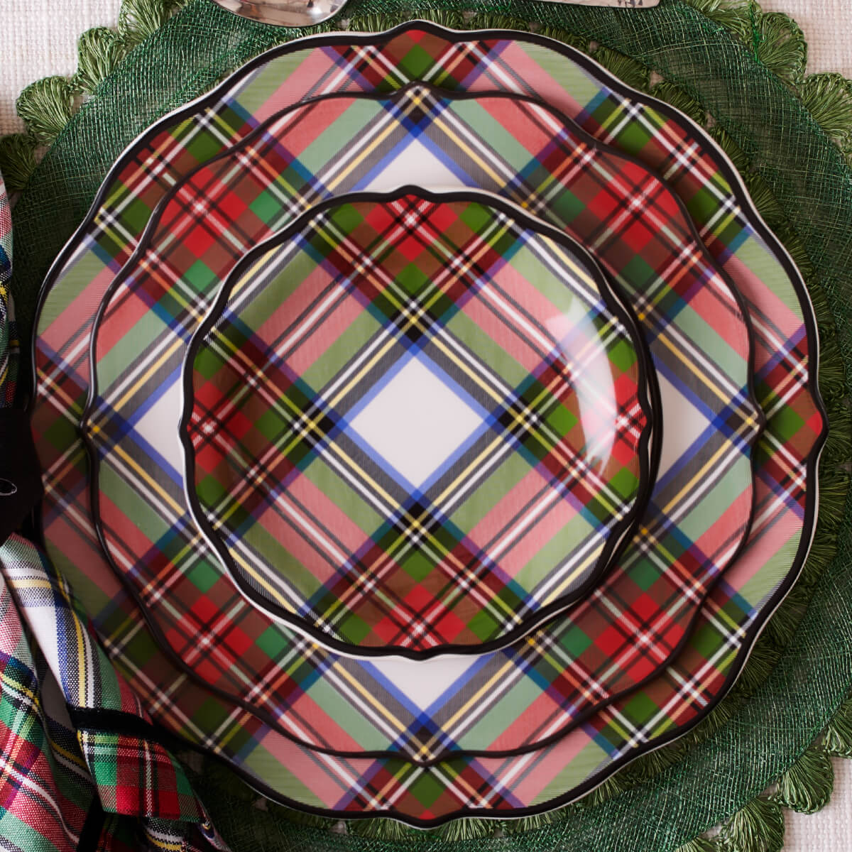 Stewart Tartan plates on a green placemat