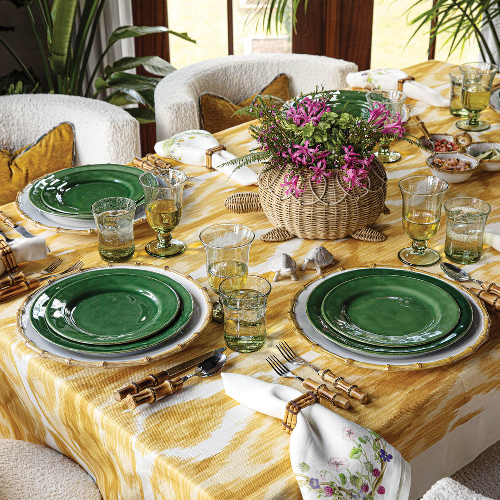 Puro Basil and Bamboo look tropical and vibrant on a yellow tablecloth.