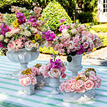 Berry \u0026 Thread Decorative Urns and Parterre Garden Vases filled with pink florals.