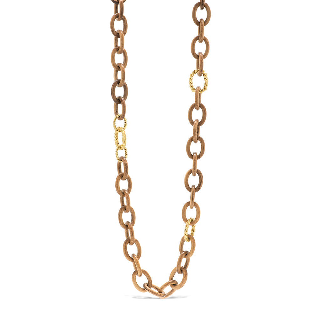A classic chain re-imagined by Mother Earth. Delicately hand carved and polished Teak wood links are accented with golden ropes. It’s a lovely reminder to drink in the fresh air and stay grounded.