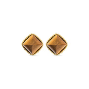 Gold and teak stud earrings.