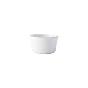 Like your favorite white shirt, this tasteful dish boasts an understated elegance that allows whatever it contains to shine in the spotlight - from homemade lemon pots de creme after dinner to an unexpected vessel to pop seasonal flowers into.