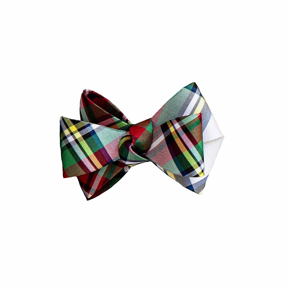 These tuxedo-inspired napkin rings, trimmed in our signature Stewart Tartan, will make a festive statement at every placesetting. Handsewn with rings wrapped in soft velvet ribbon, these dapper bows will festoon any table with festively elegant flair.