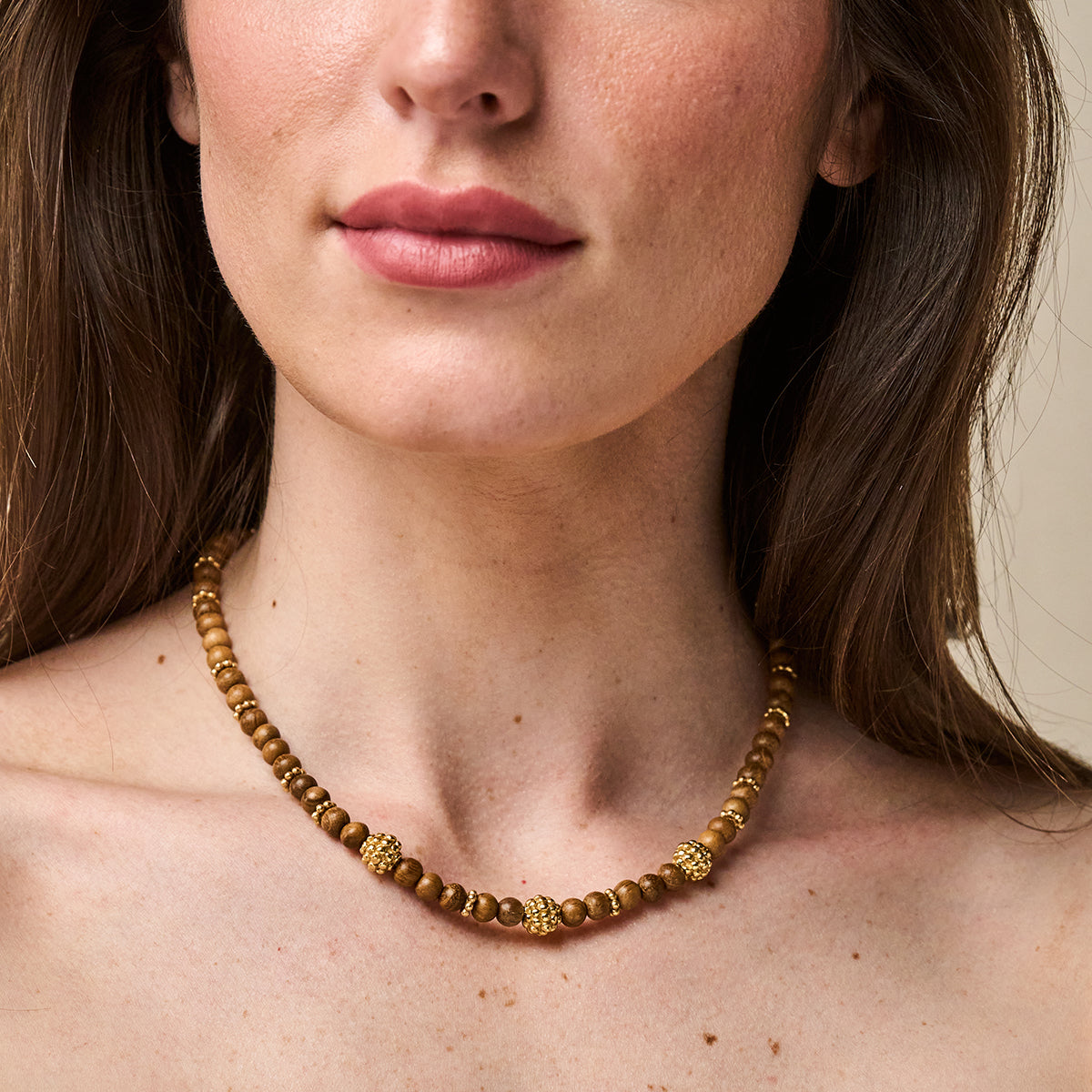 Berry Single Strand Petite Beads Necklace, 16"+2"- Teak close up of necklace on model 