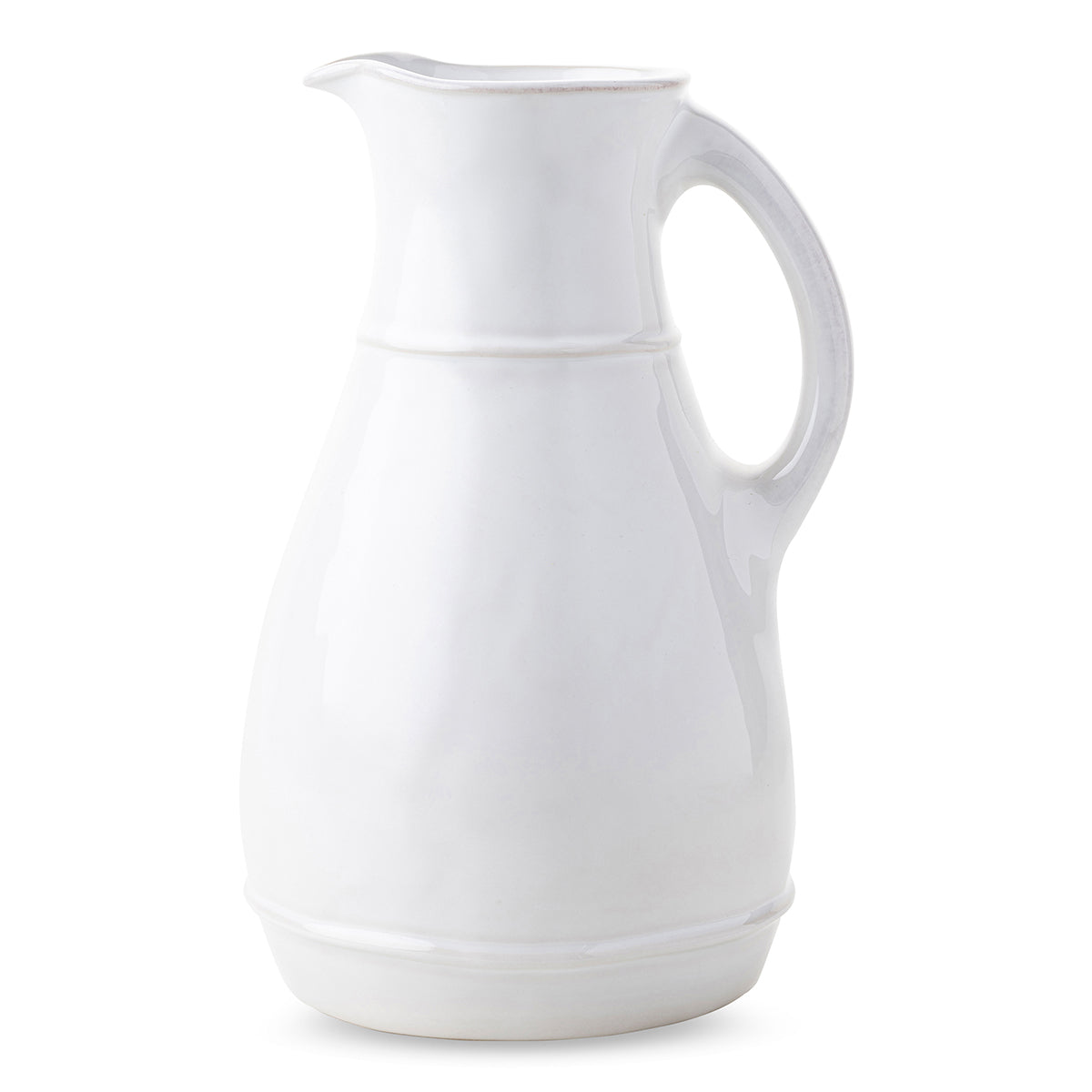 From fresh juices to a bundle of colorful blooms, this whitewash ceramic pitcher offers an organic texture that blends everyday elegance with practicality.