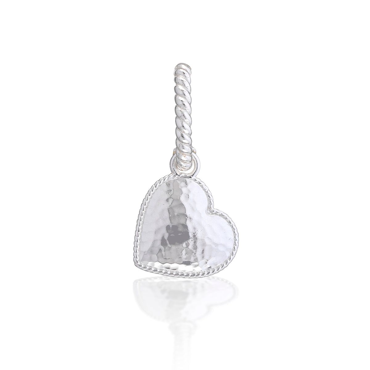 A silver heart-shaped charm with a hammered texture and a twisted rope clasp, shown on a clean white background with a soft reflection below.