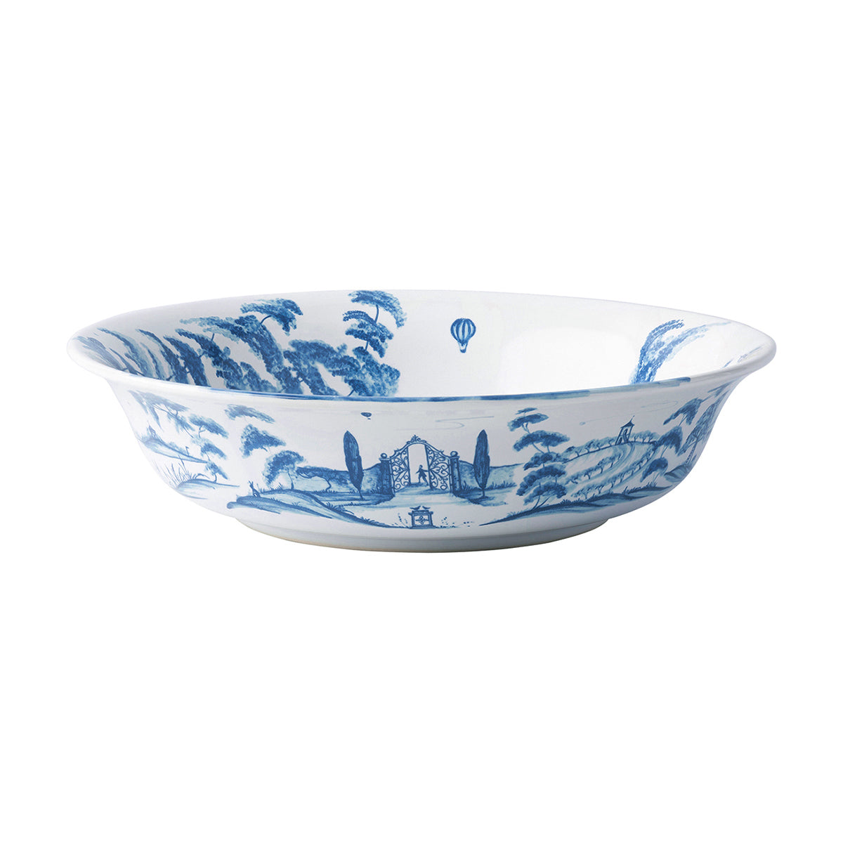 10 inch white serving bowl with blue artwork of a country estate painted on it.