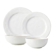 From our Puro Collection - Everything you need to set a stylish place at your table - perfect for parties, and eminently useful for everyday. Four piece setting includes Dinner Plate, Dessert/Salad Plate, Cereal/Ice Cream Bowl and Coupe Bowl.