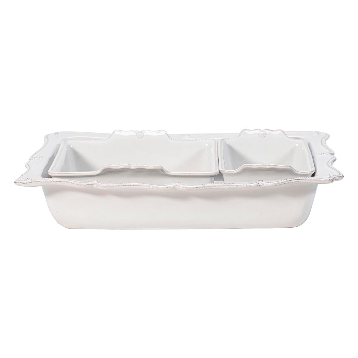 This space-efficient nesting trio is a triumph for home bakers! Practical and pretty, our oversized 17” rectangular baker features a beautiful scalloped edge reminiscent of a ruffled apron, and can snugly accommodate our loaf pan (Baker? Loaf baker? Need to keep consistent) and square baker, to easily fit all three together in your cupboard. Perfect for beloved holiday recipes and for feeding a crowd -- and those lovely handles make taking these dishes from the oven to the table…and easy as pie!