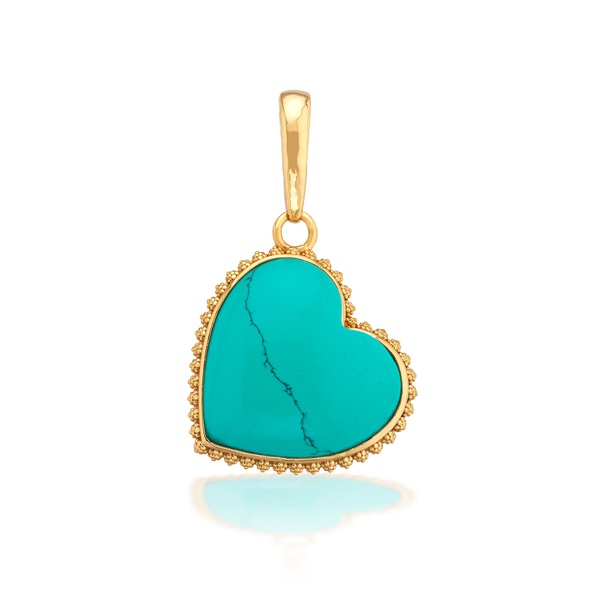 A love token to add to any bracelet or necklace chain, with a natural, hand-carved and polished turquoise heart trimmed in our signature bright gold twisting thread to carry with you wherever you go. This oversized heart is a statement piece that makes a fabulous gift for your beloved—or yourself!