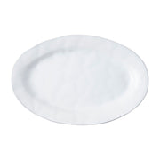 From our Quotidien Collection - For your main-course masterpiece! Our platter's simple organic form paired with lustrous white glaze creates the perfect backdrop for your piece de resistance.