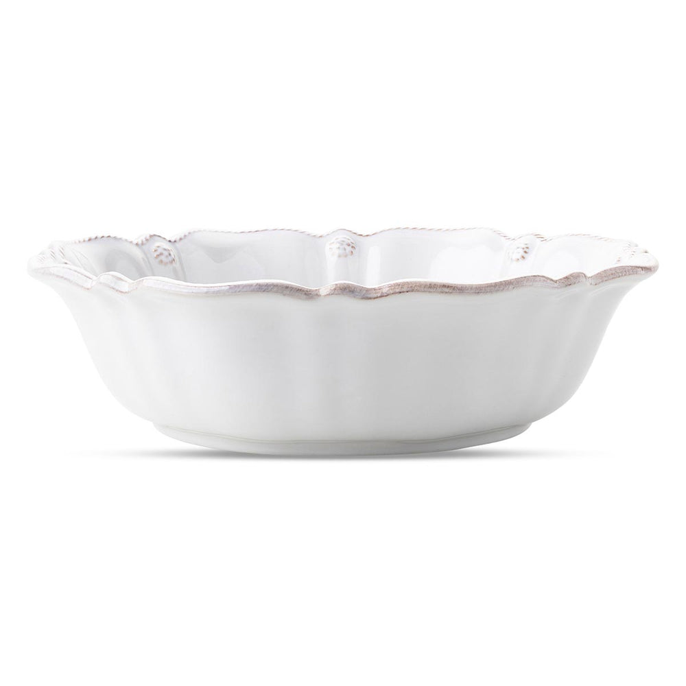 With its fluted edges and refined details, this versatile bowl is fantastic for serving colorful salads, fresh pastas or as a countertop staple filled with fresh fruit.