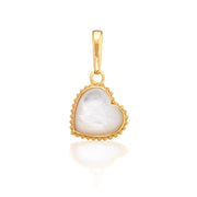 A love token to add to any bracelet or necklace chain, a natural, hand-carved and polished mother of pearl heart trimmed in our signature bright gold twisting thread to carry with you wherever you go. This oversized heart is a statement piece that makes a fabulous gift for your beloved—or yourself!