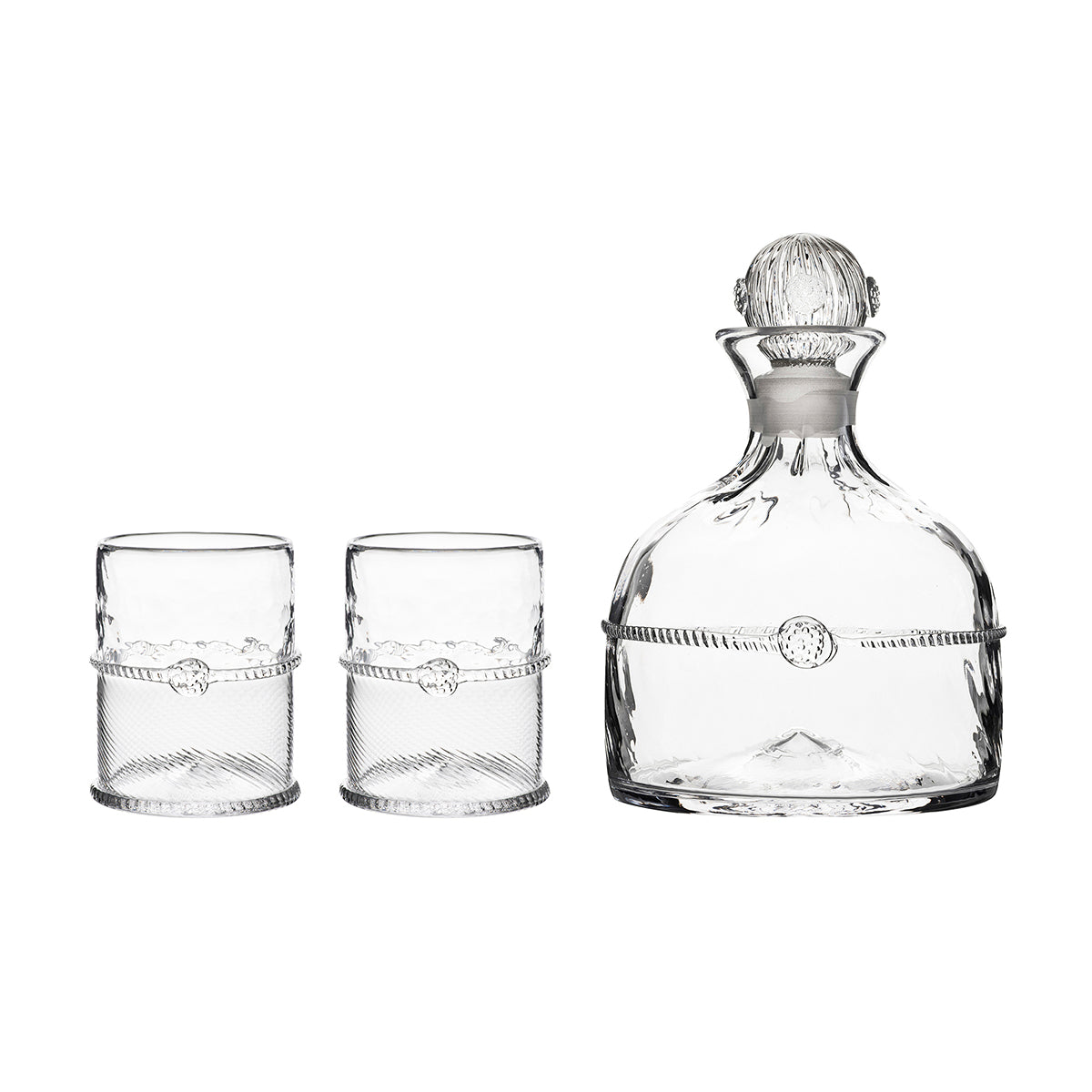 For when only the unforgettable will do, this stunning decanter of artisanal mouth-blown glass is a statement piece for any home bar. Crowned with a simple thread and single berry, dressed in optic glass from the waist down and belted with a charming sash, our Graham decanter makes a devastatingly handsome set with our matching pair of Double Old Fashioned glasses. Stoke the fire, pour your best single malt, and settle into an evening. Comes packaged in our signature Juliska gift box.